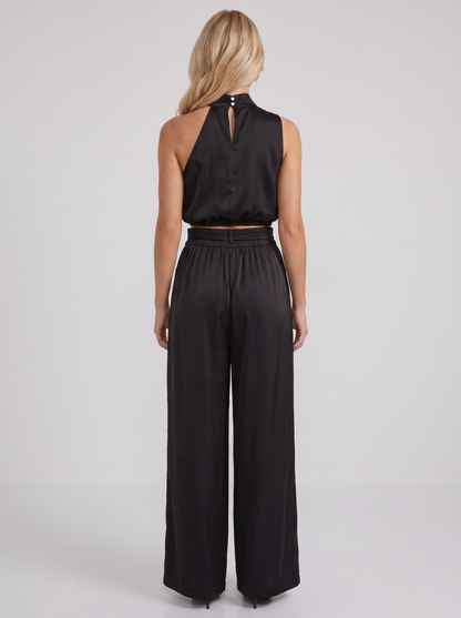 Women black pants set with halter crop top and draped satin front