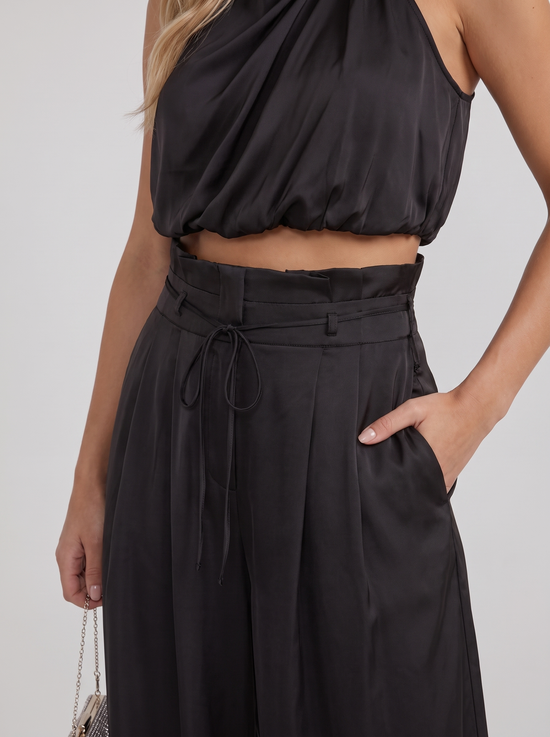 Women black pants set with halter crop top and draped satin front