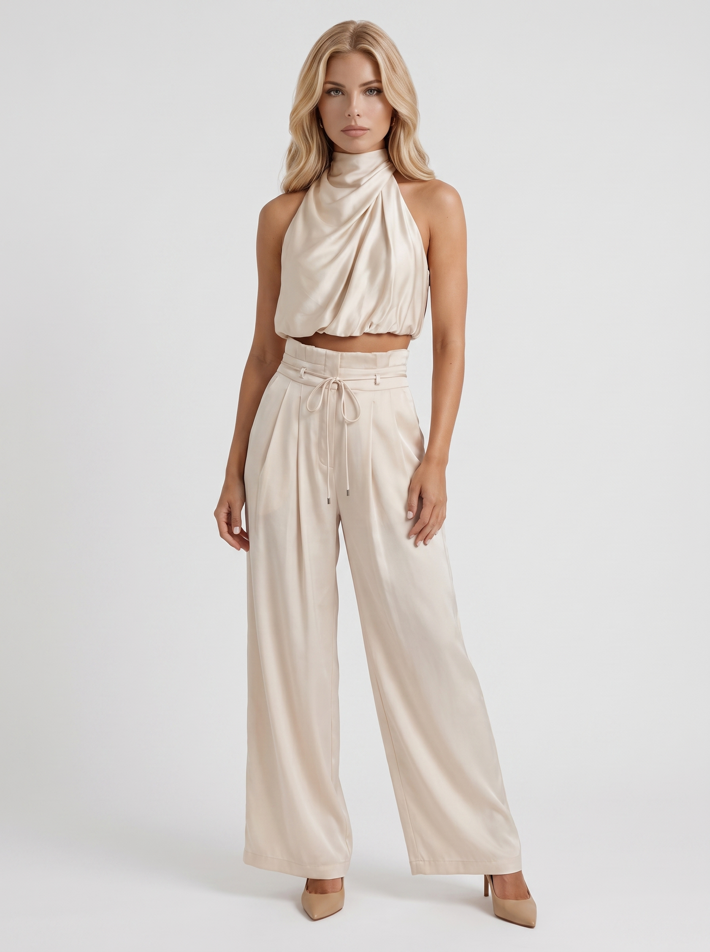 Women champagne pants set with halter crop top and draped satin front