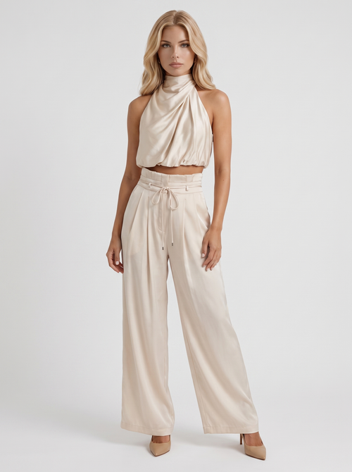 Women champagne pants set with halter crop top and draped satin front