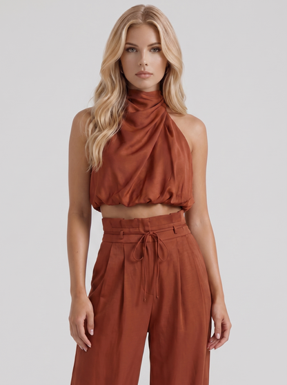Women red pants set with halter crop top and draped satin front