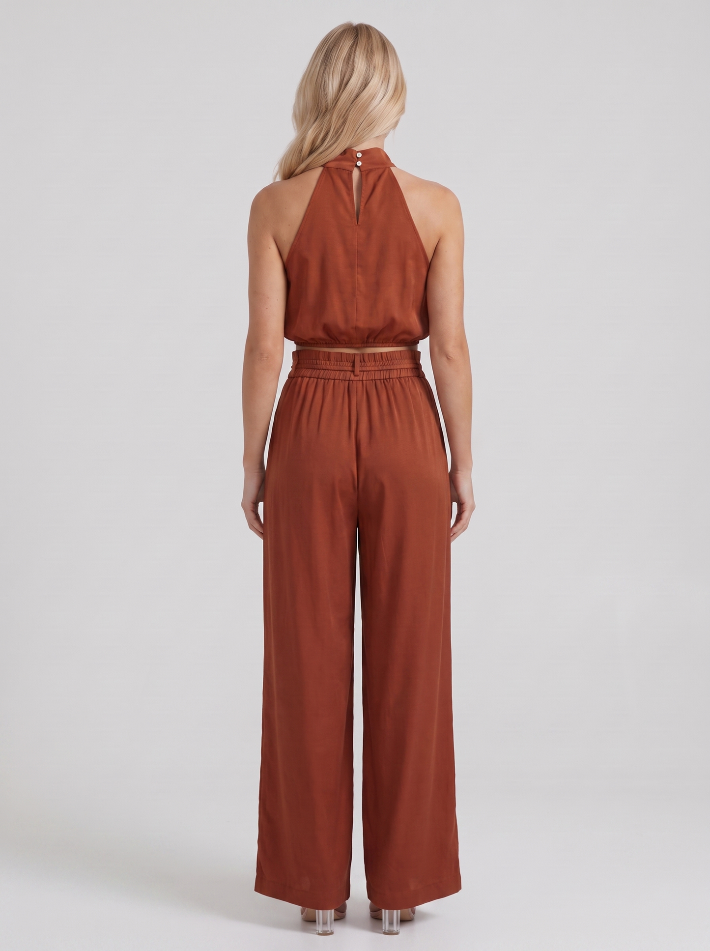 Women red pants set with halter crop top and draped satin front