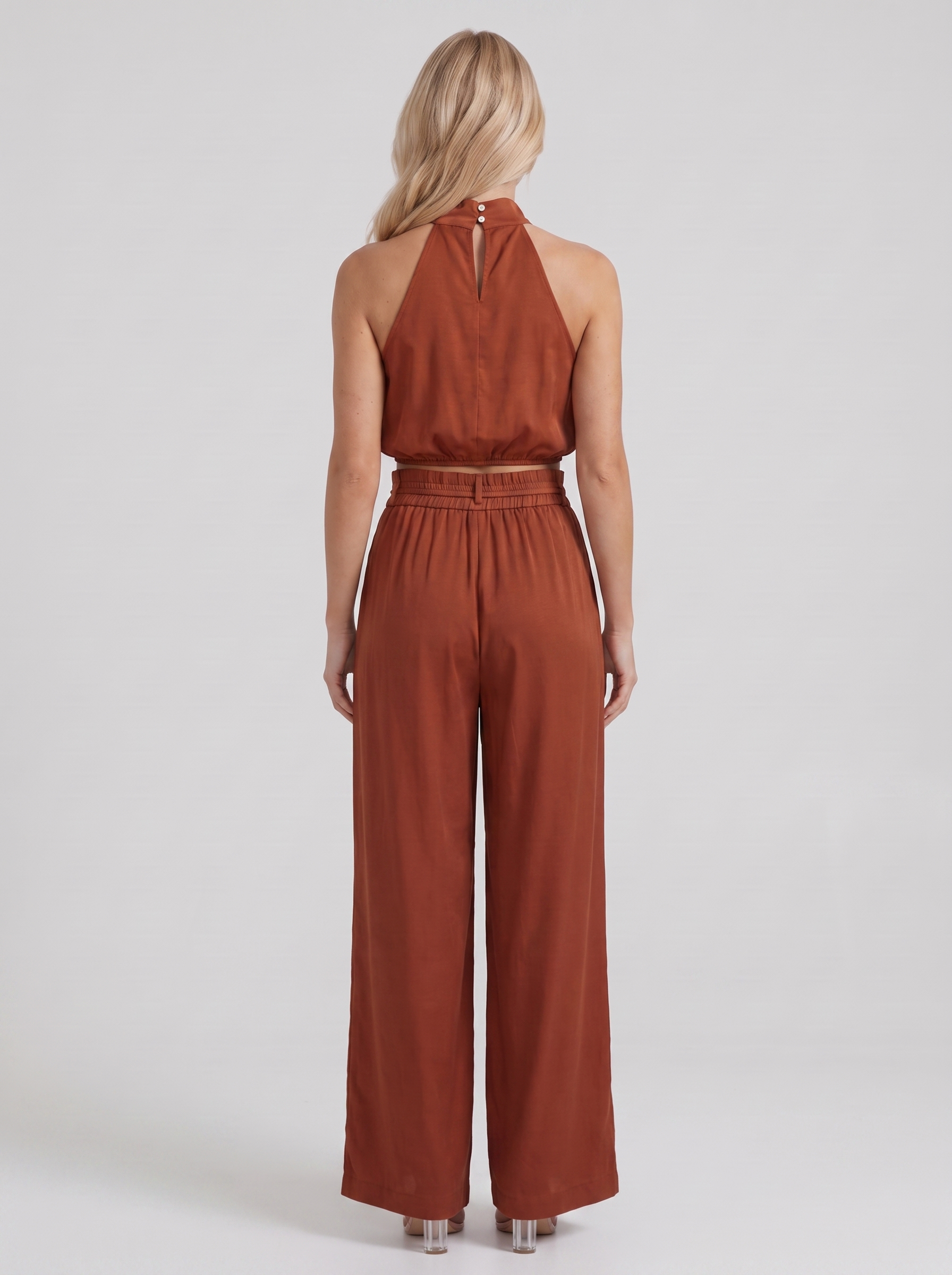 Women red pants set with halter crop top and draped satin front