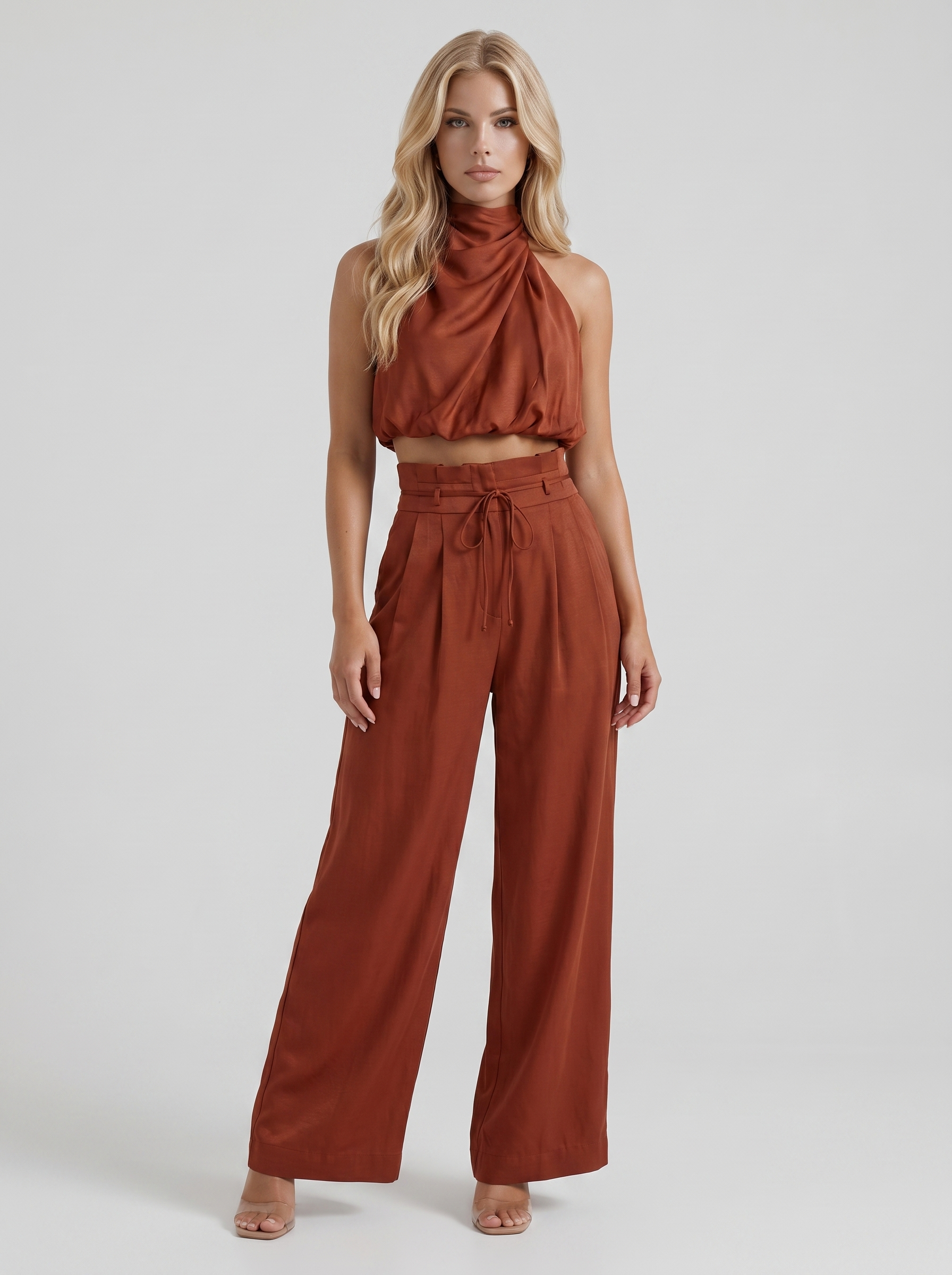 Women red pants set with halter crop top and draped satin front