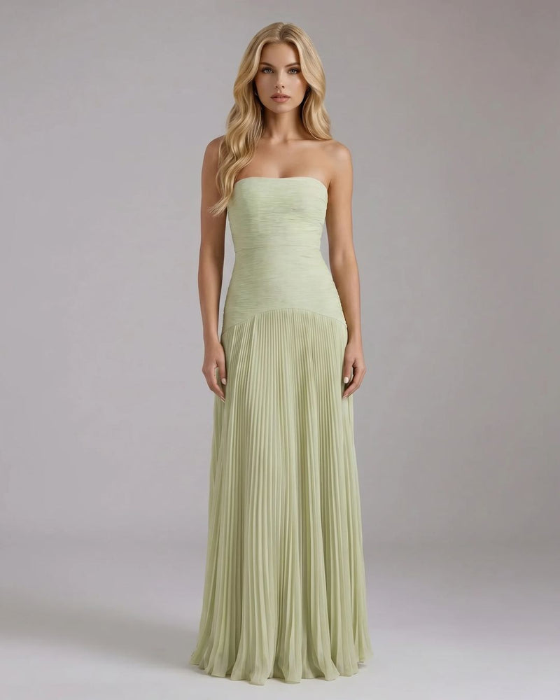 Full-length Kenzie Forest maxi dress in light green, featuring a strapless ruched bodice and a flowing pleated skirt.