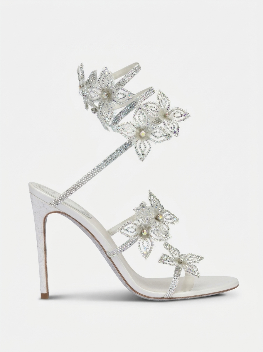 Women silver heeled sandals with wrap straps and rhinestone detail