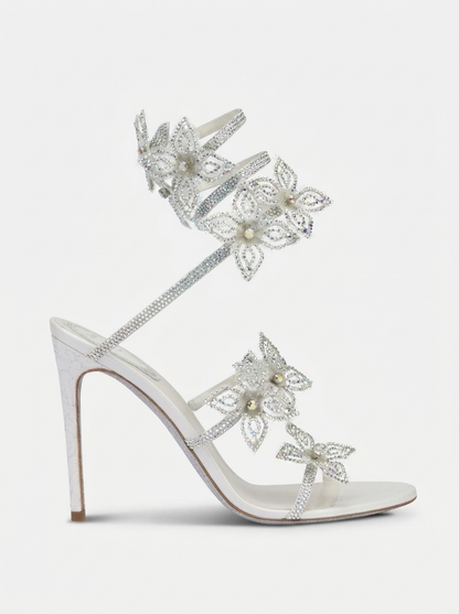 Women silver heeled sandals with wrap straps and rhinestone detail