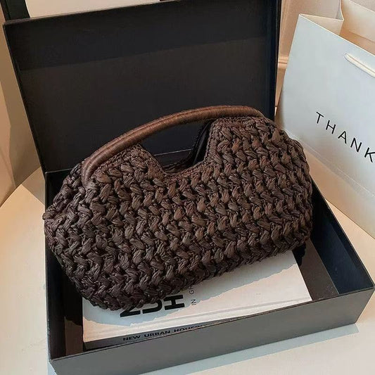 Women brown clutch bag with raffia weave and woven body