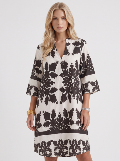 Women white floral midi dress with v neckline and floral print