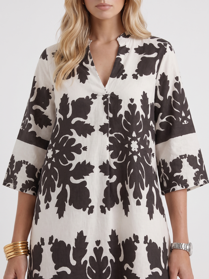 Women white floral midi dress with v neckline and floral print