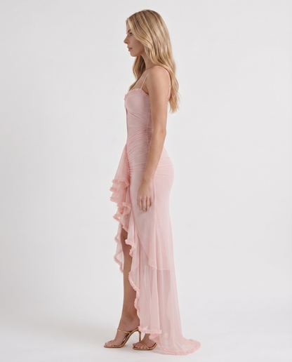 Women pink cutout maxi dress with ruched body and ruffle skirt, side profile