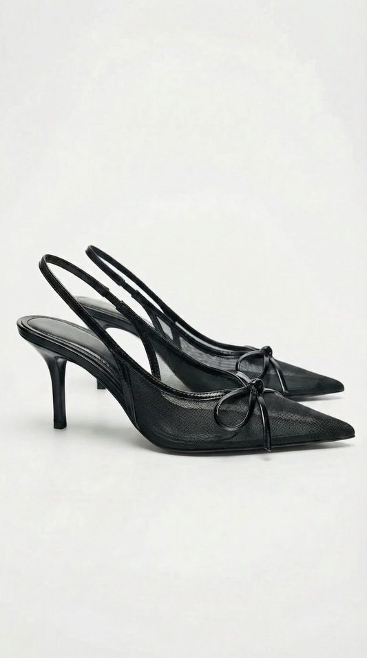 Women black heeled sandals with pointed toe and slingback strap