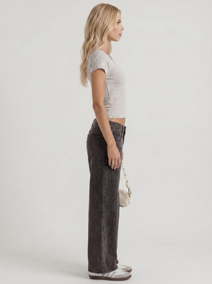 Women black washed low rise wide leg jeans, side profile view
