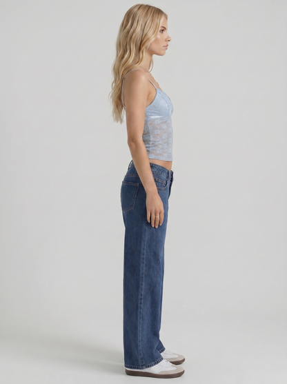 Women blue washed low rise wide leg jeans, side profile view