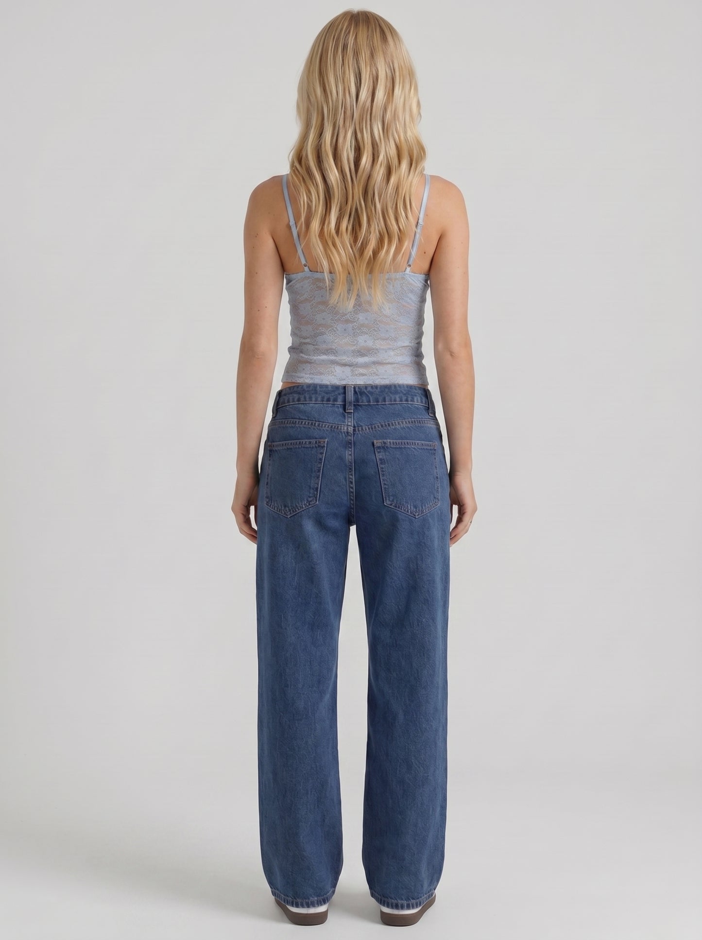 Women blue washed low rise wide leg jeans, back view