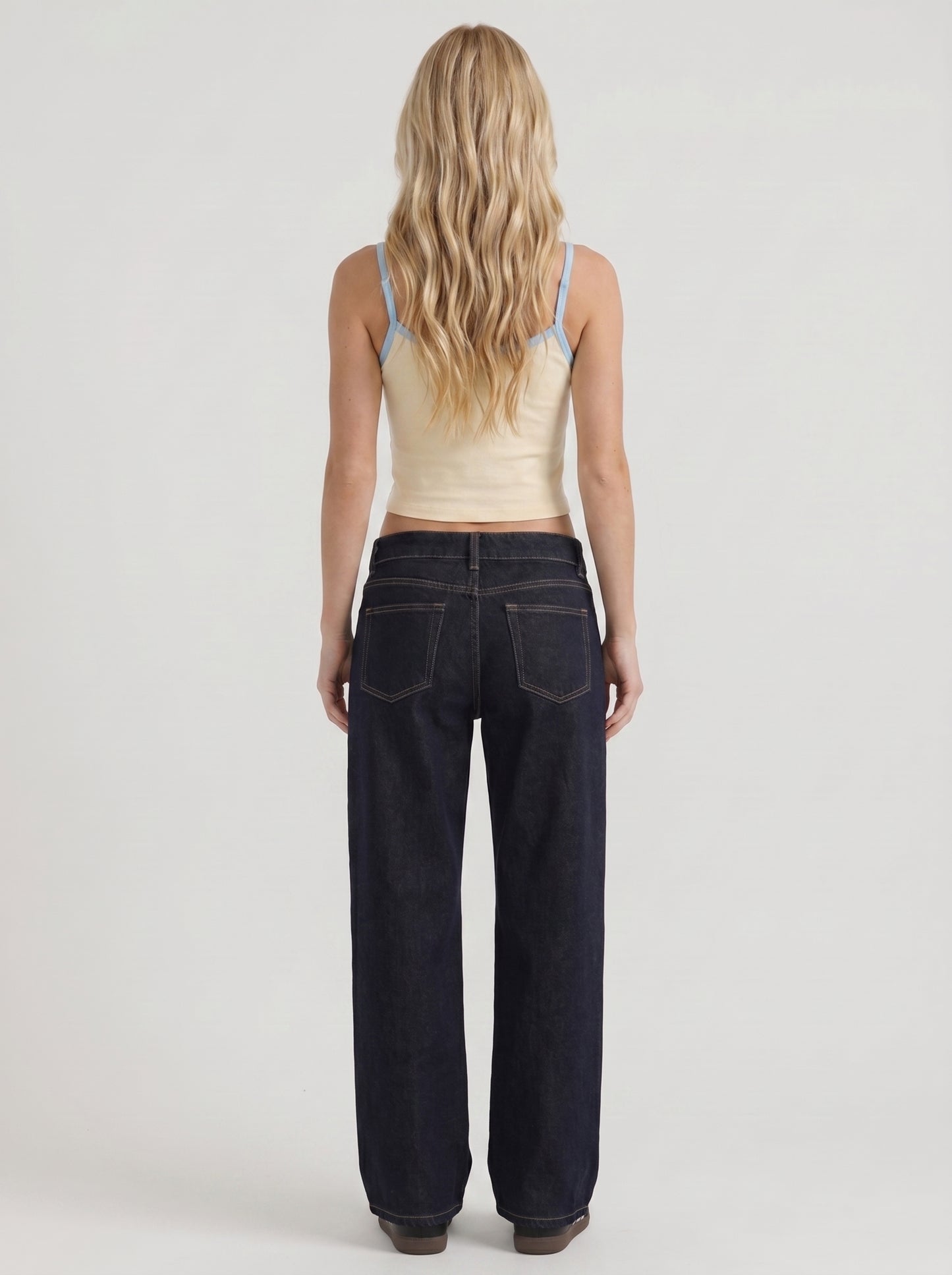Women indigo blue washed low rise wide leg jeans, back view
