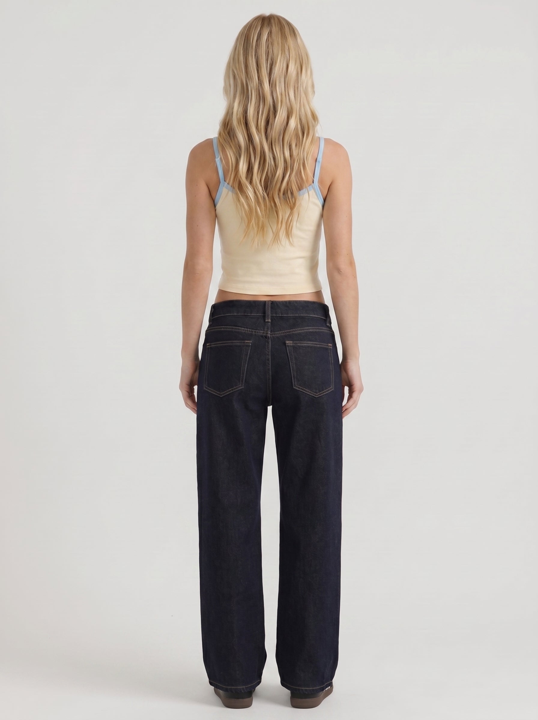 Women indigo blue washed low rise wide leg jeans, back view