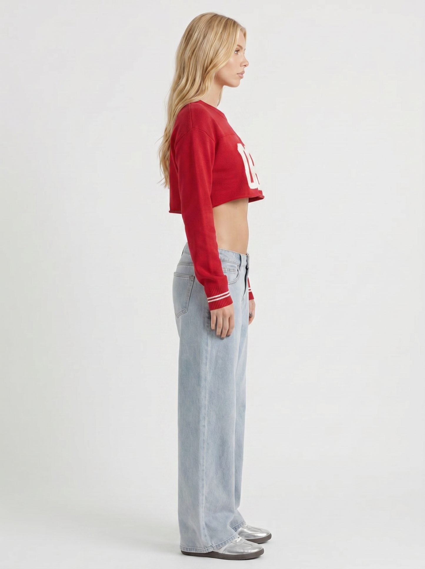 Women light blue with red stitch low rise wide leg jeans, side profile view