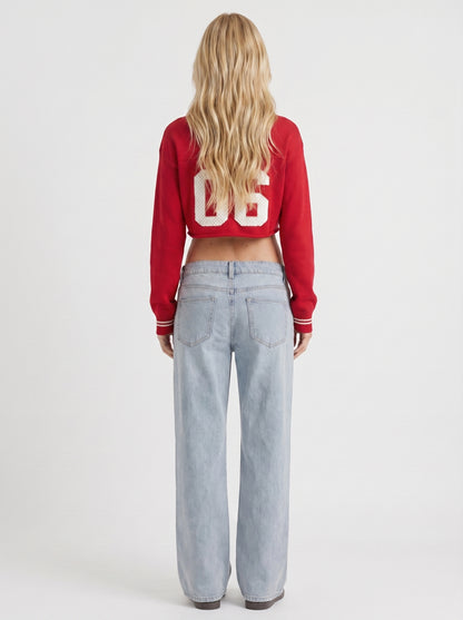 Women light blue with red stitch low rise wide leg jeans, back view