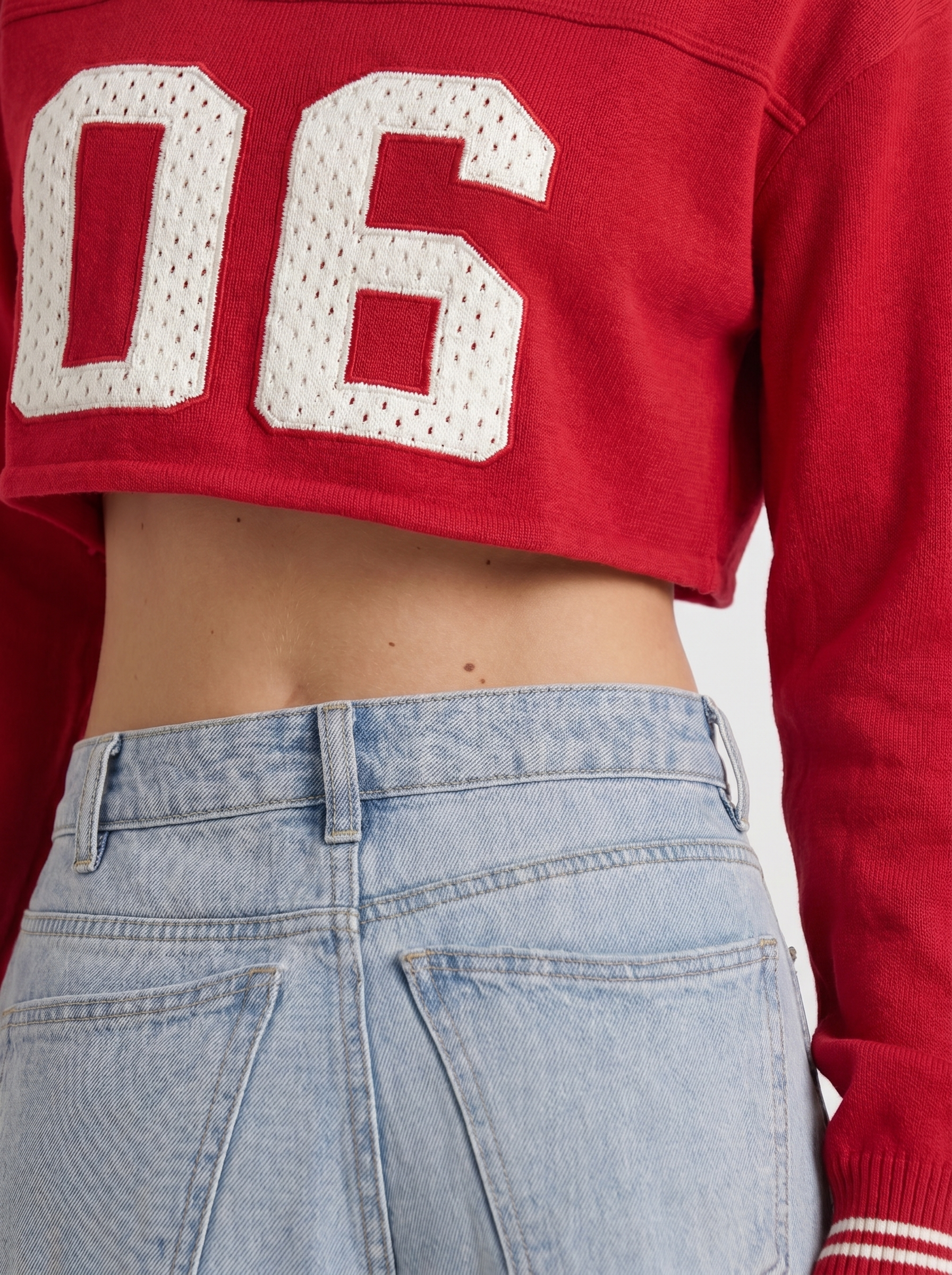 Women light blue with red stitch low rise wide leg jeans, detail view