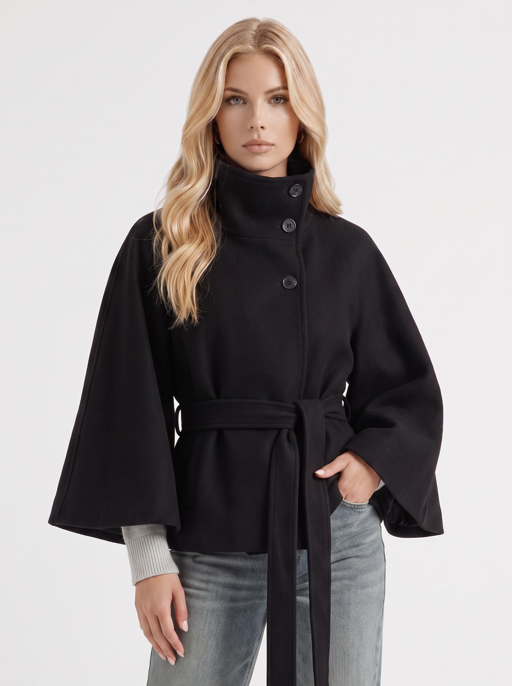 Women's black cape jacket with cape sleeves and waist tie belt