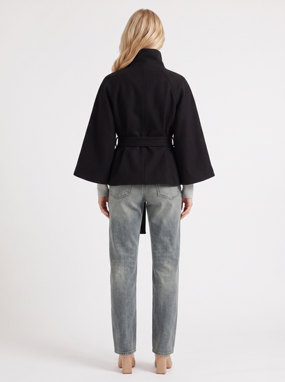 Women's black cape jacket with cape sleeves and waist tie belt