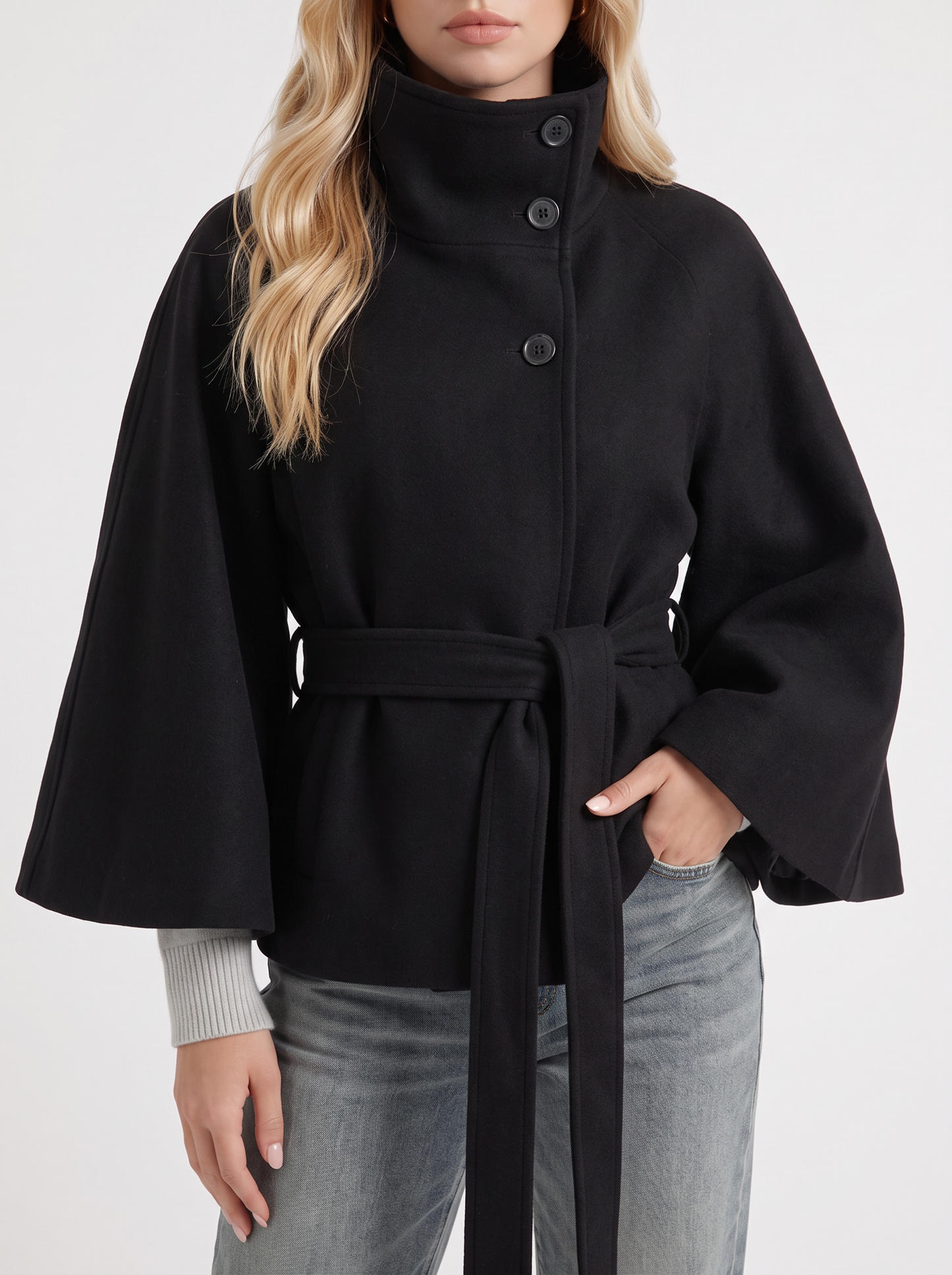Women's black cape jacket with cape sleeves and waist tie belt