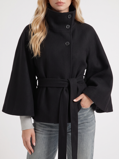 Women's black cape jacket with cape sleeves and waist tie belt