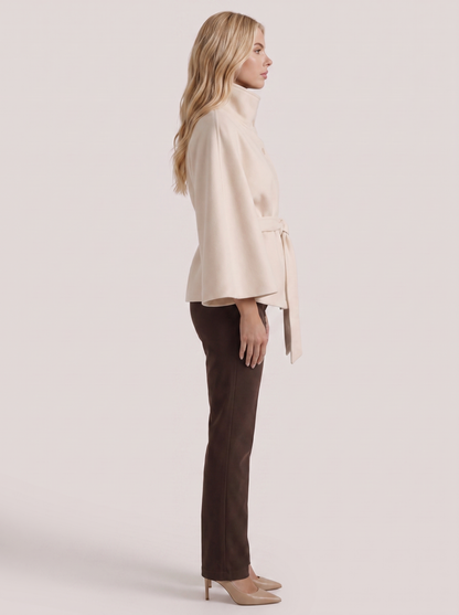 Women's cream cape jacket with cape sleeves and waist tie belt