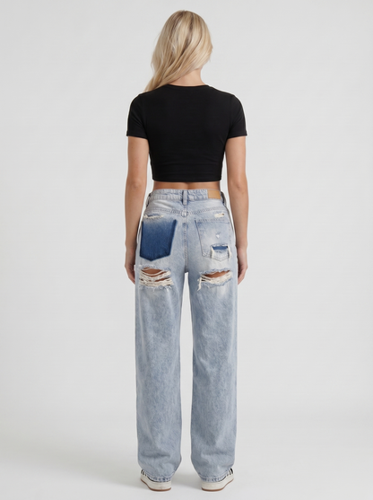 Women light blue baggy mid rise distressed wide leg jeans, back view