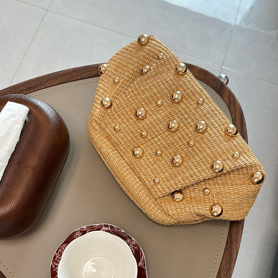 Women khaki clutch bag with studded detail and woven body