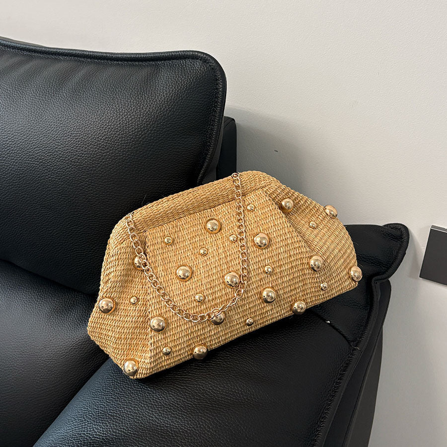 Women khaki clutch bag with studded detail and woven body