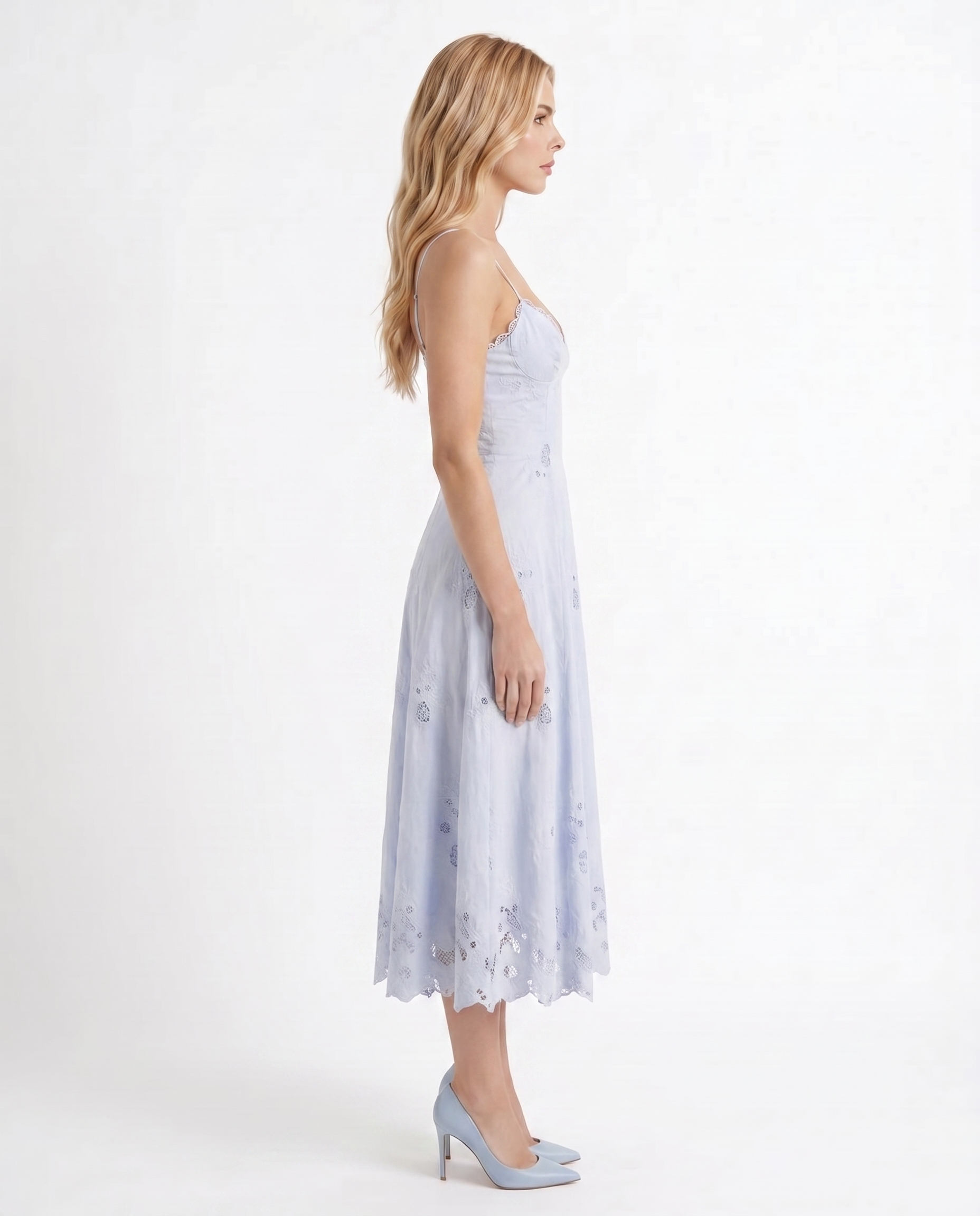 Women blue V neck midi dress with embroidered scalloped hem, side profile