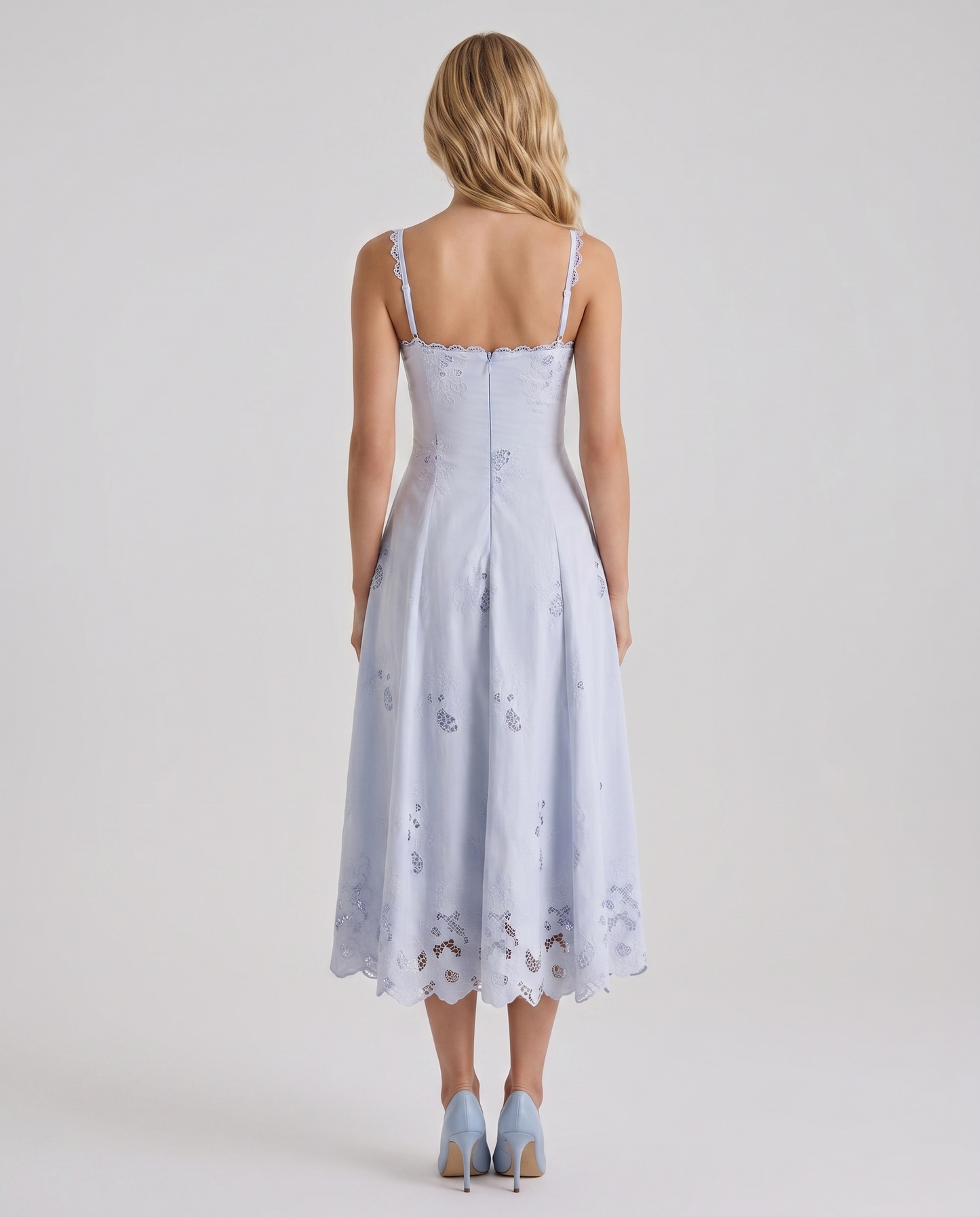 Women blue V neck midi dress with spaghetti strap back and scalloped hem, back view