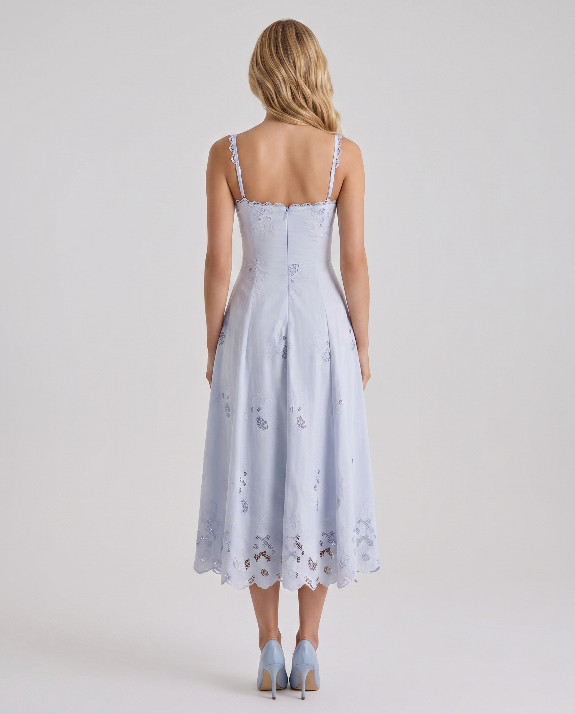 Women blue V neck midi dress with spaghetti strap back and scalloped hem, back view