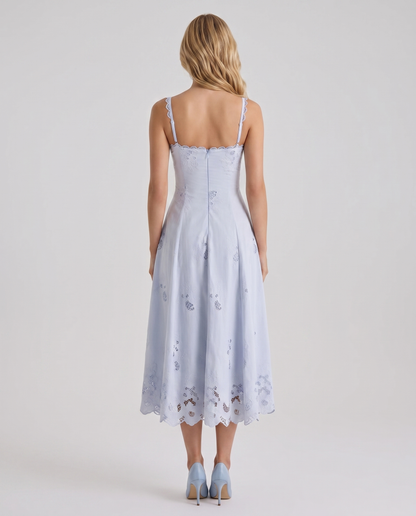 Women blue V neck midi dress with spaghetti strap back and scalloped hem, back view