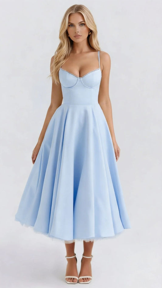 Women light blue sweetheart midi dress with full skirt shown front on. Model wears white heels.