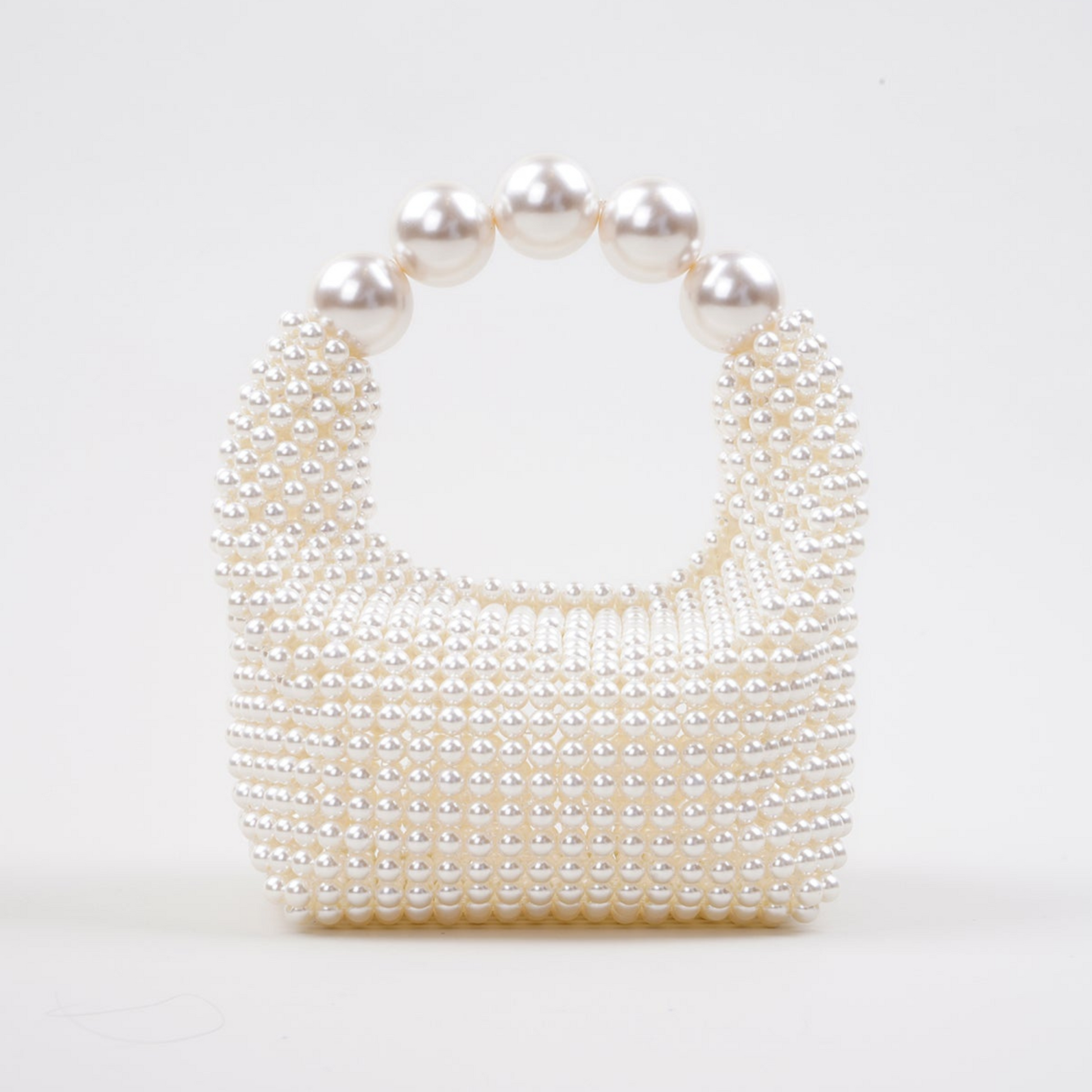 Women white bag with top handle and pearl beading