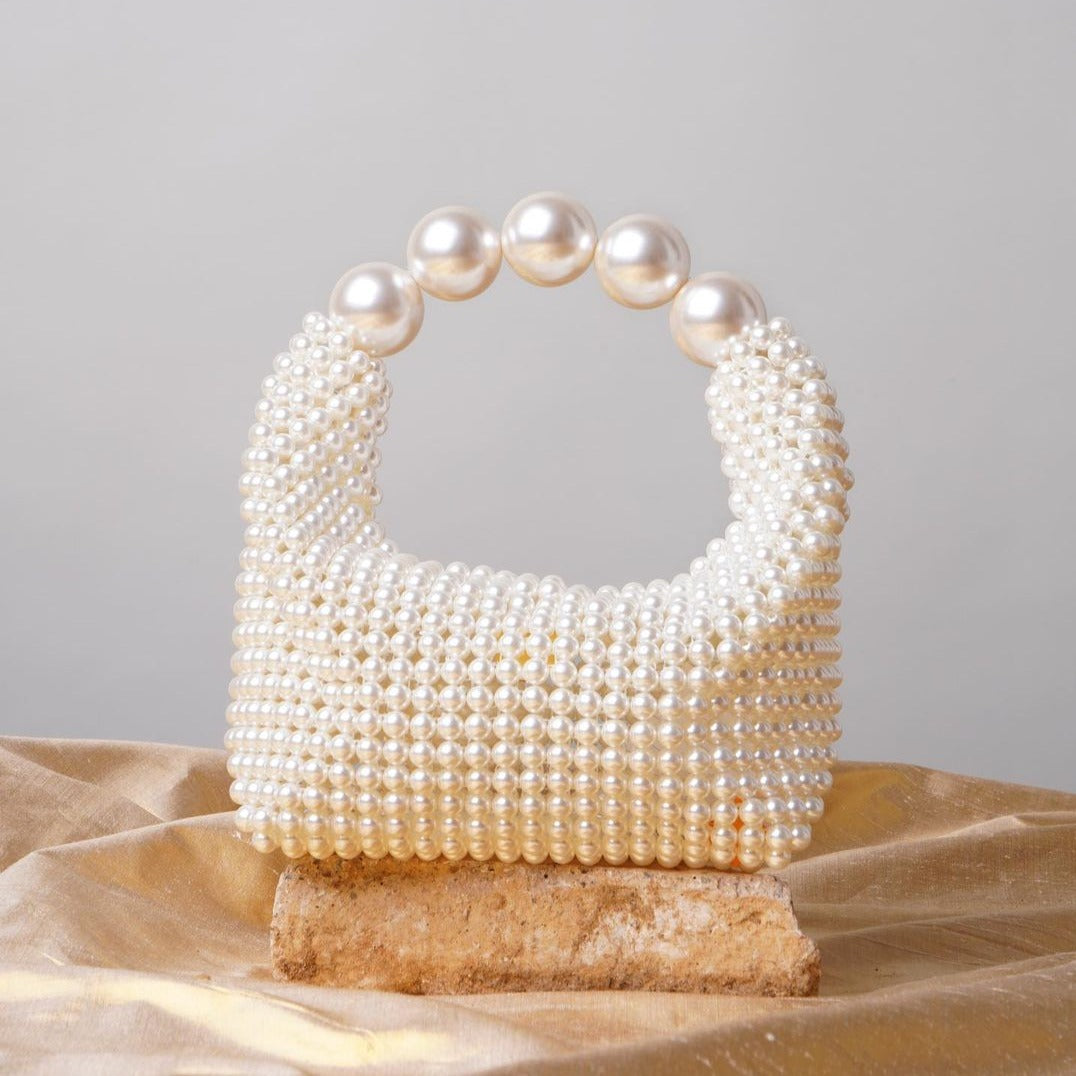 Women white bag with top handle and pearl beading