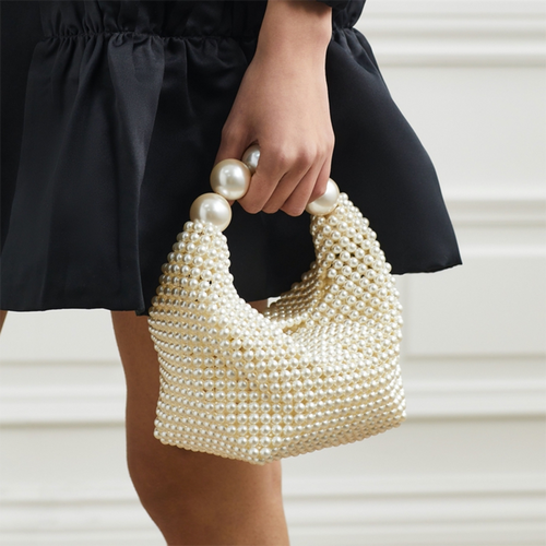 Women white bag with top handle and pearl beading