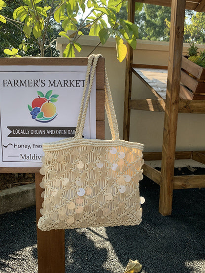 Women ivory tote bag with sequin finish and woven body