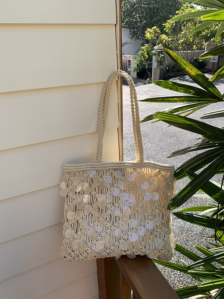 Women ivory tote bag with sequin finish and woven body