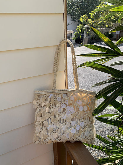 Women ivory tote bag with sequin finish and woven body