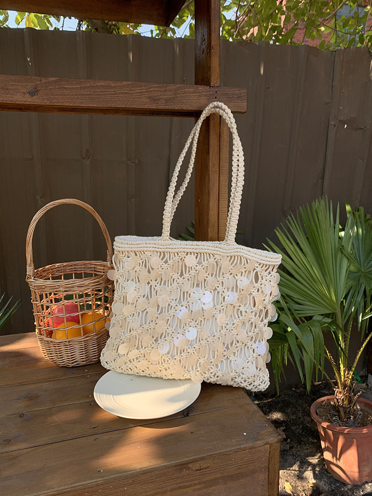Women ivory tote bag with sequin finish and woven body