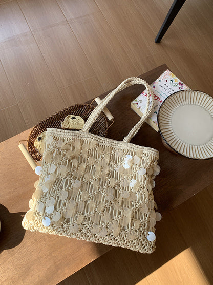 Women ivory tote bag with sequin finish and woven body