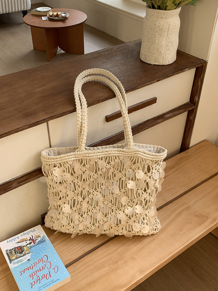 Women ivory tote bag with sequin finish and woven body