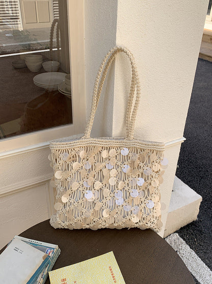Women ivory tote bag with sequin finish and woven body