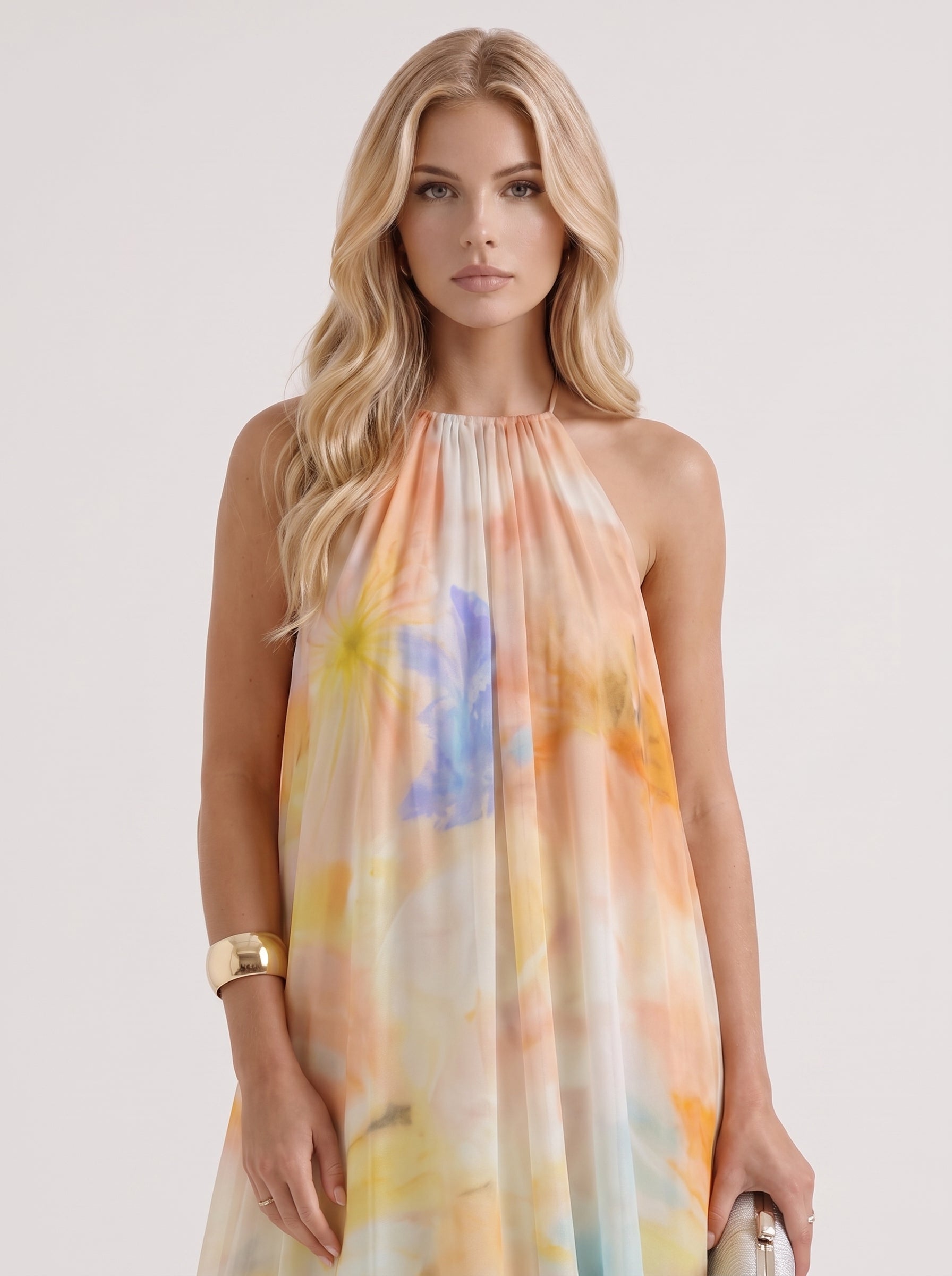 Women orange maxi dress with halter neckline and chiffon fabric