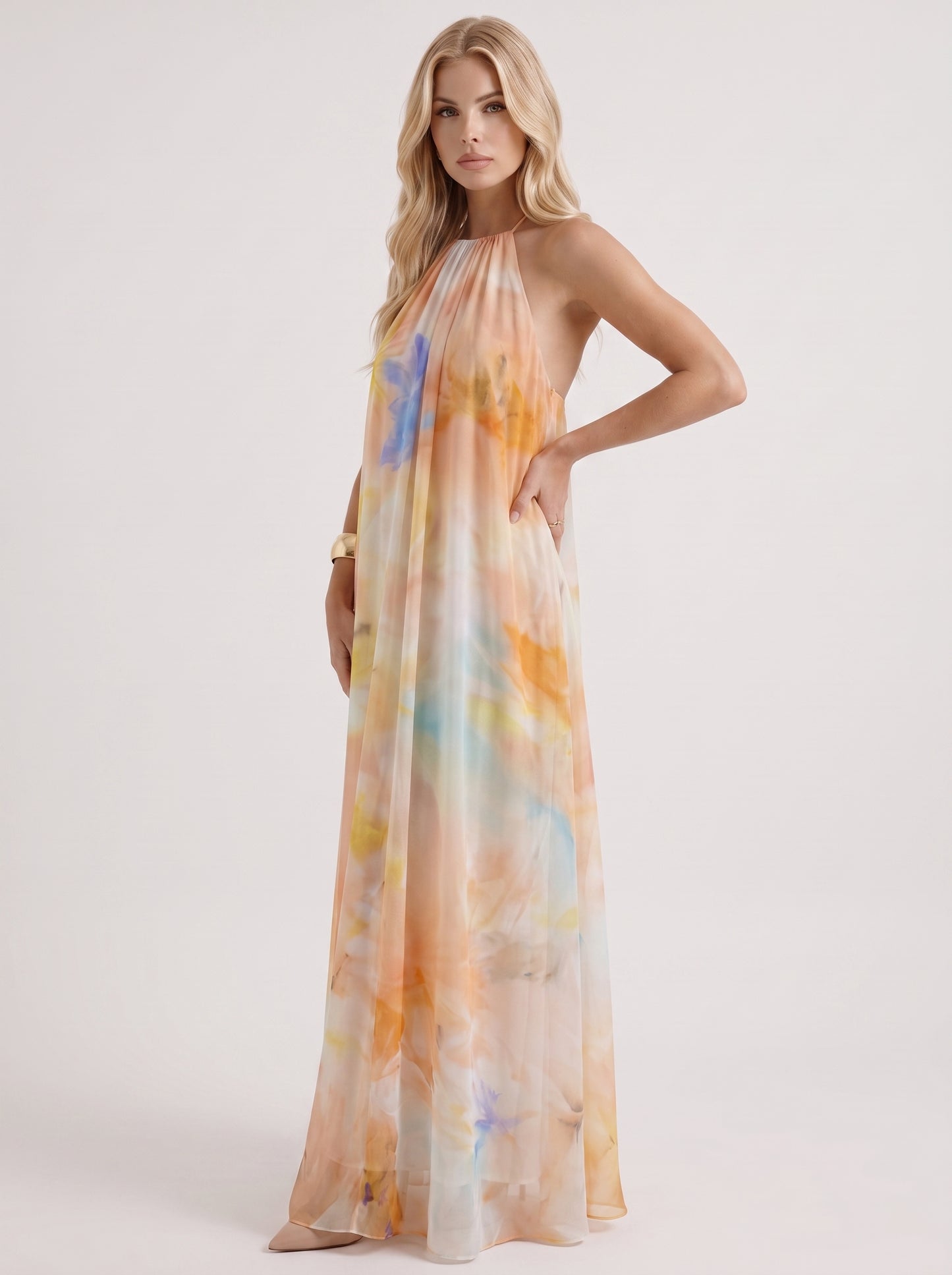 Women orange maxi dress with halter neckline and chiffon fabric