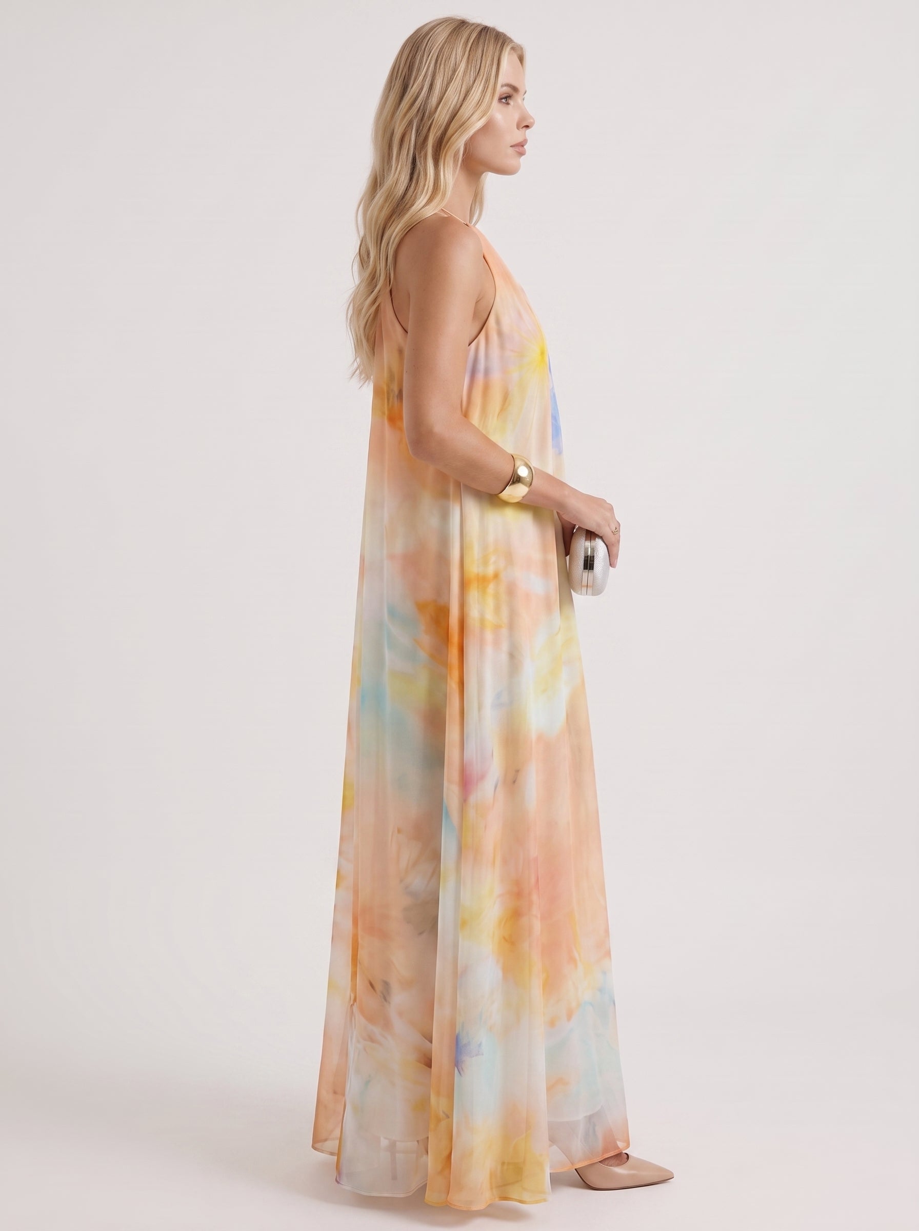Women orange maxi dress with halter neckline and chiffon fabric